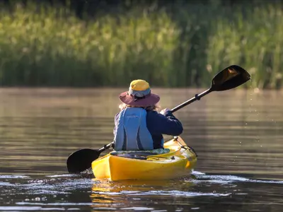 Woman kayaking on the lake