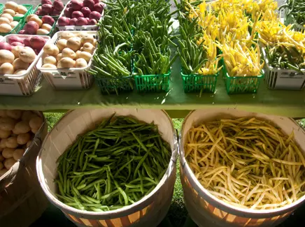Vegetables at a farmers' market stand